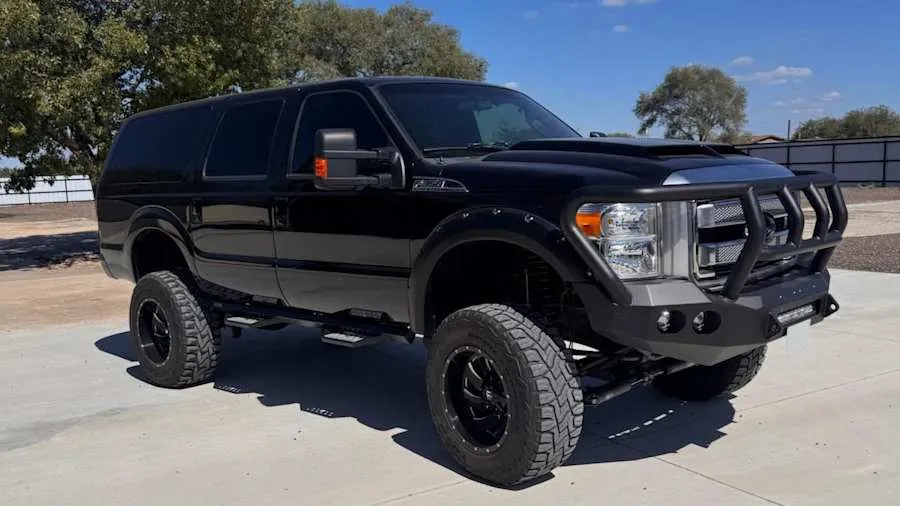 Black 2012 Ford Excursion Conversion
