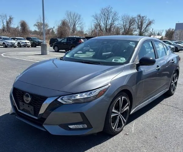 A grey 2021 Nissan Sentra in a parking lot